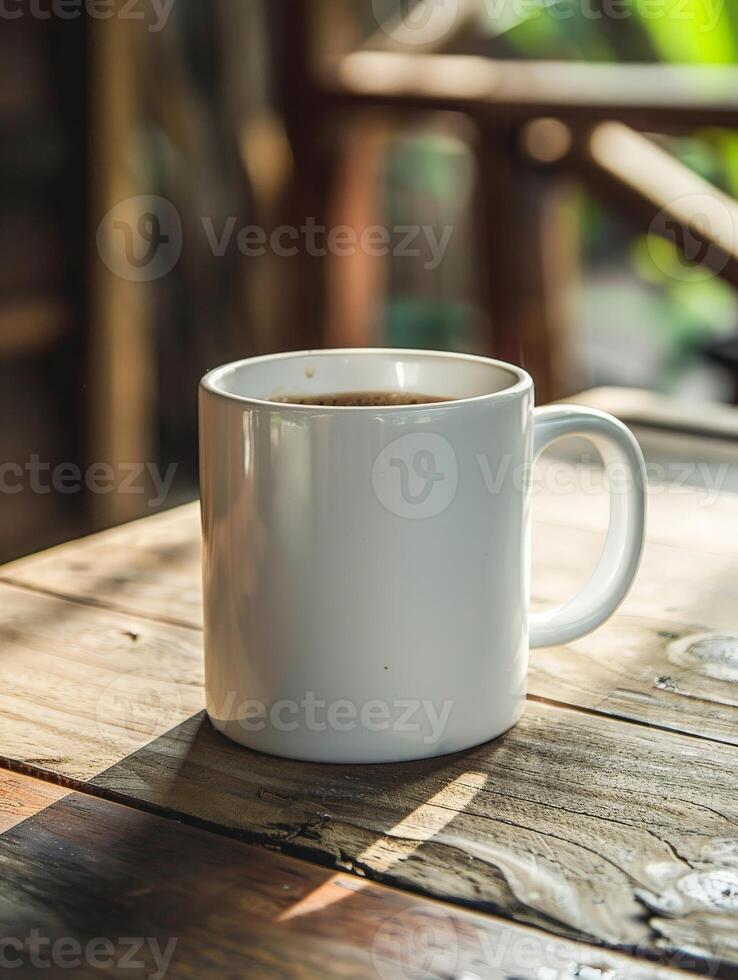 A White Mug of Coffee on a Wooden Table at an Outdoor Cafe photo