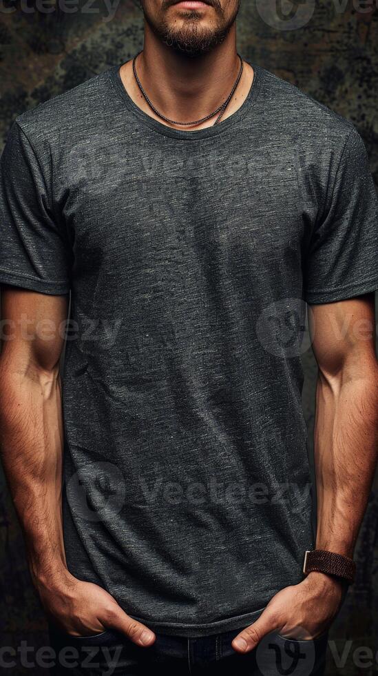 Man Wearing Grey T-Shirt and Leather Bracelet Posing Against Rough Wall photo
