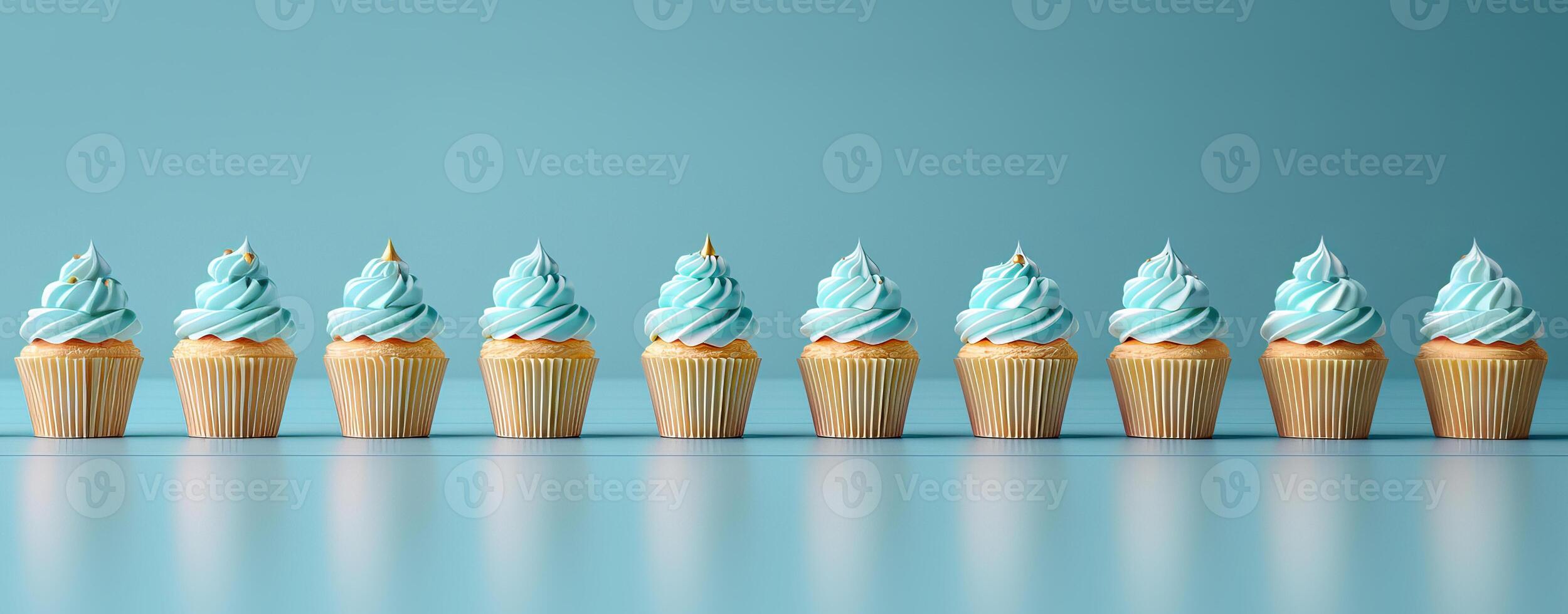 Row plain monochrome light turquoise frosted cupcakes simple blue background, minimalism, copy space photo