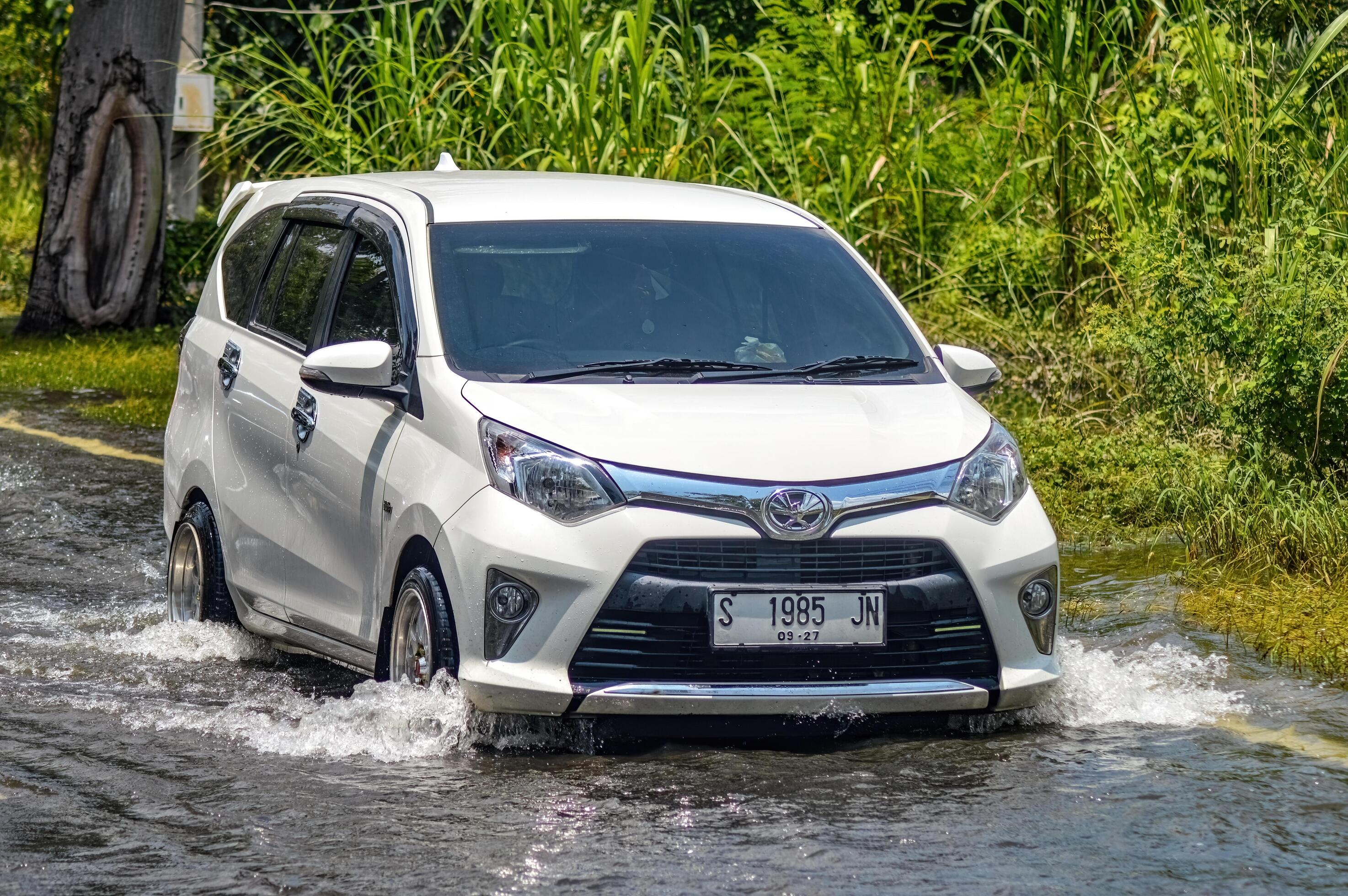 a white car that crashed into floods in Gresik Regency Indonesia 20