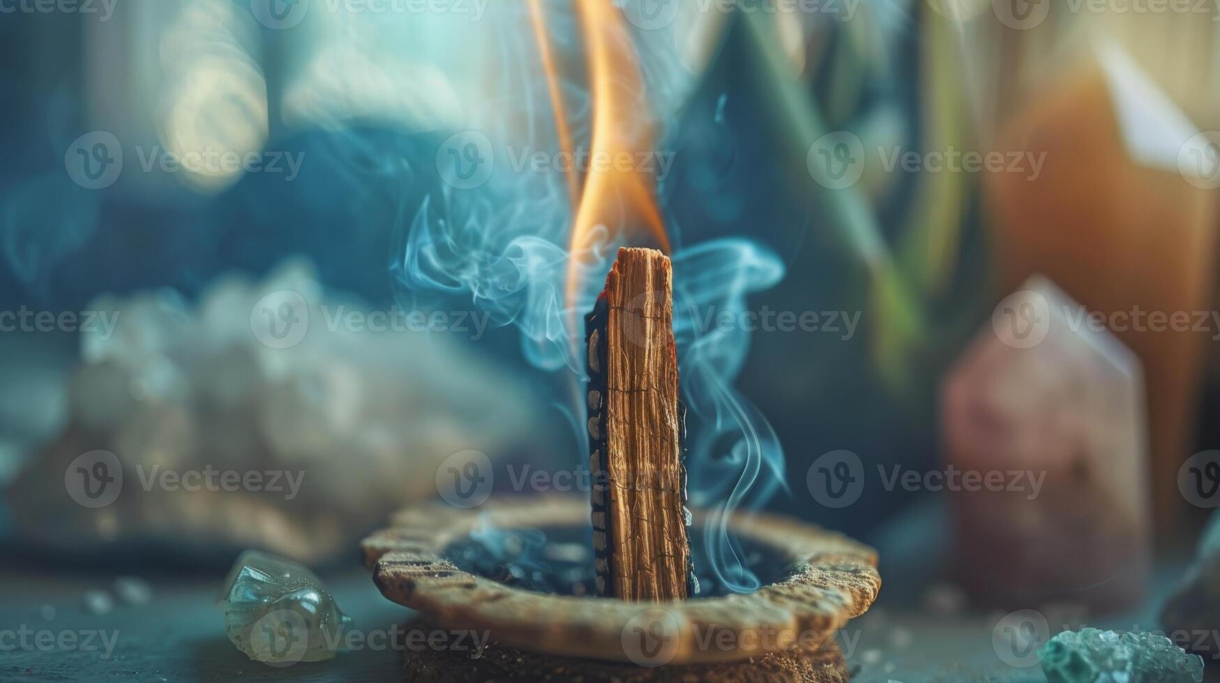A smoldering palo santo stick on a ceramic dish, its smoke rising and cleansing energy of crystals photo