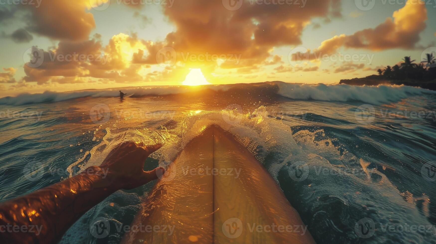 Surfer Paddling on Surfboard Towards the Waves at sunset. POV summer photo, first-person perspective photo