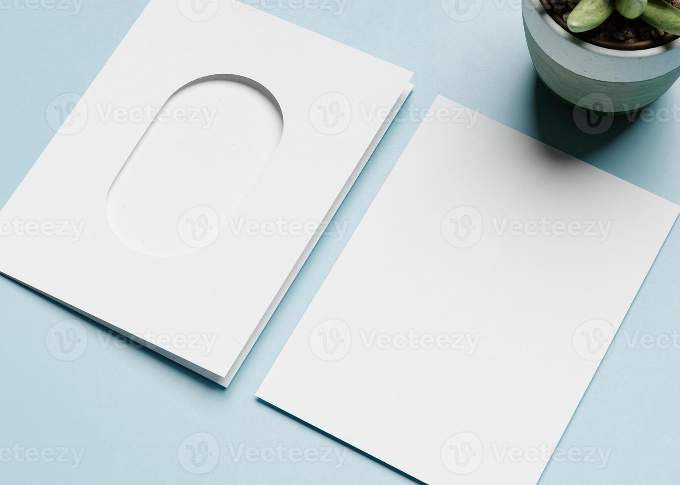 An invitation card with an arch-shaped hole, perfect for wedding invitation mockups and more. photo