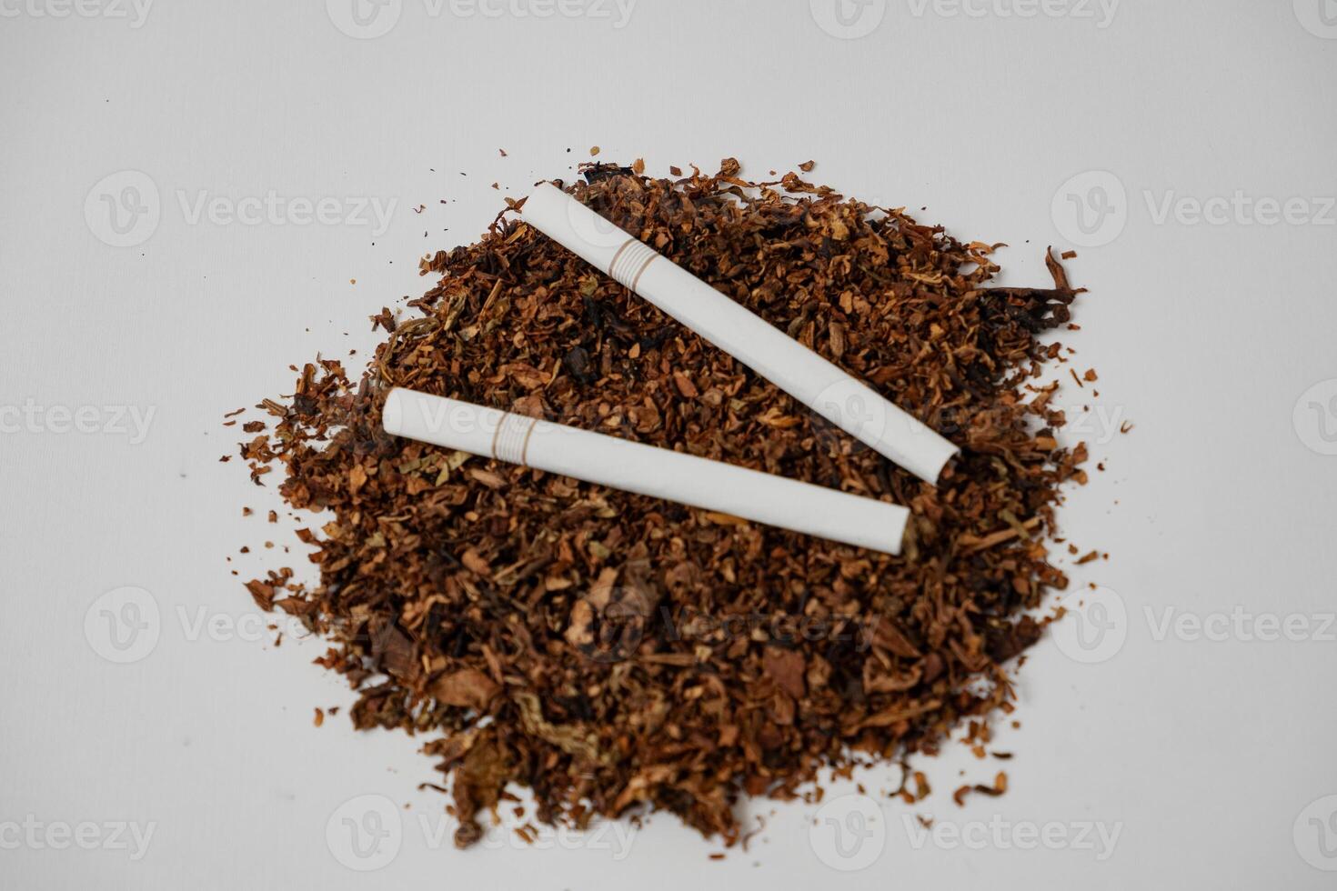 fine tobacco with a cigarettes on top photo