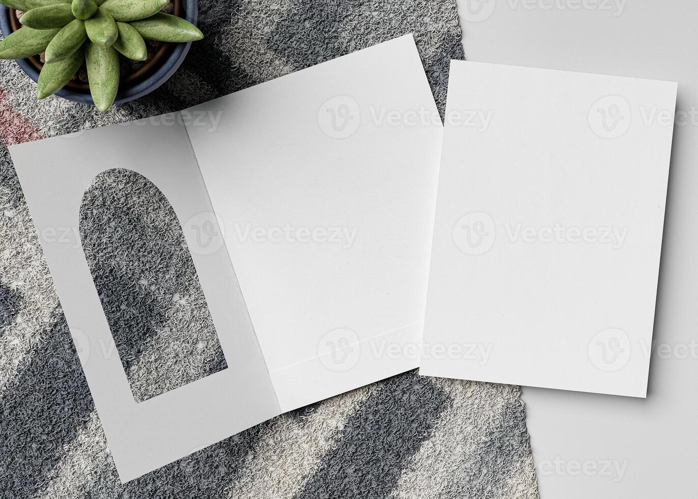 An invitation card with an arch-shaped hole, perfect for wedding invitation mockups and more. photo