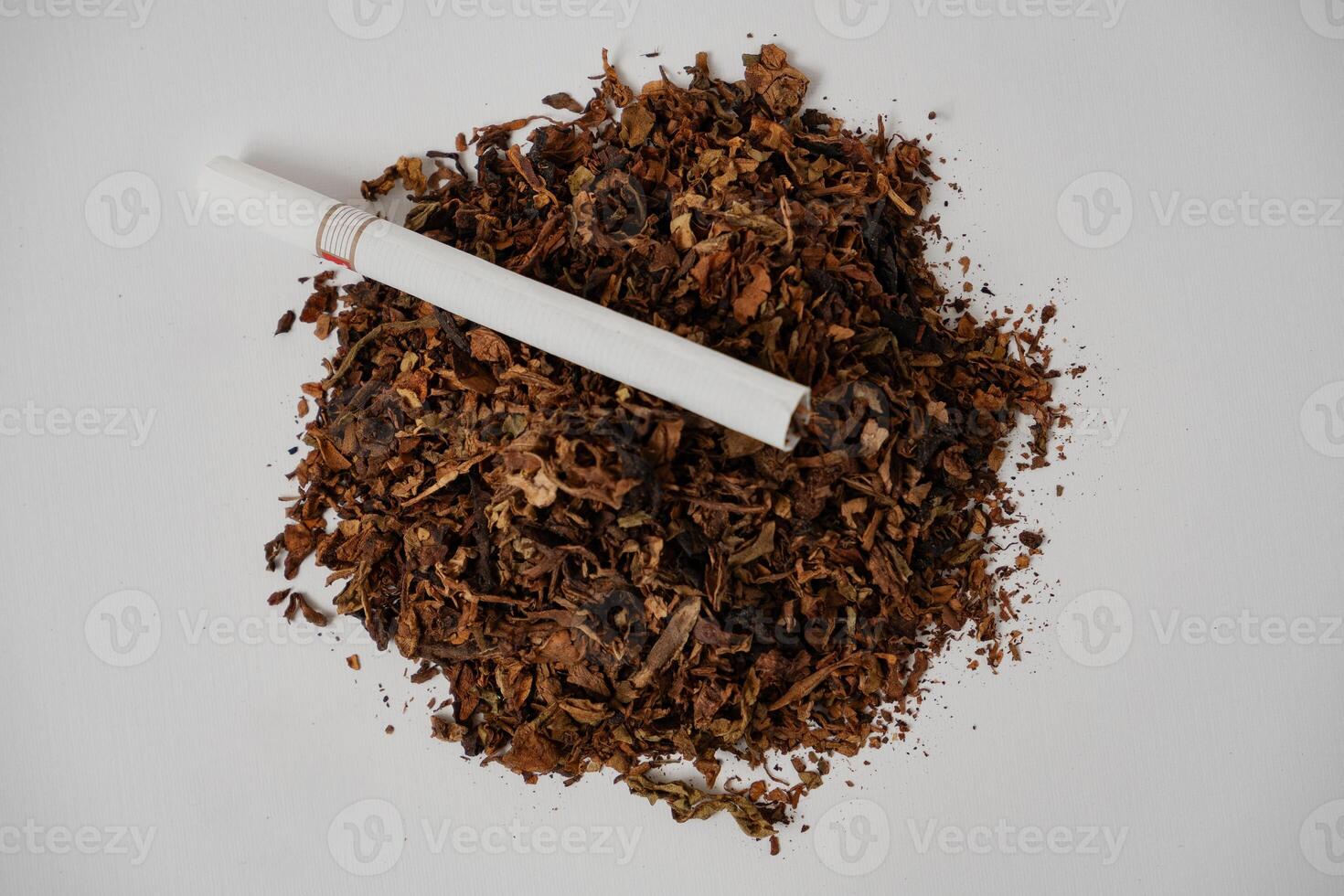 fine tobacco with a cigarette on top photo