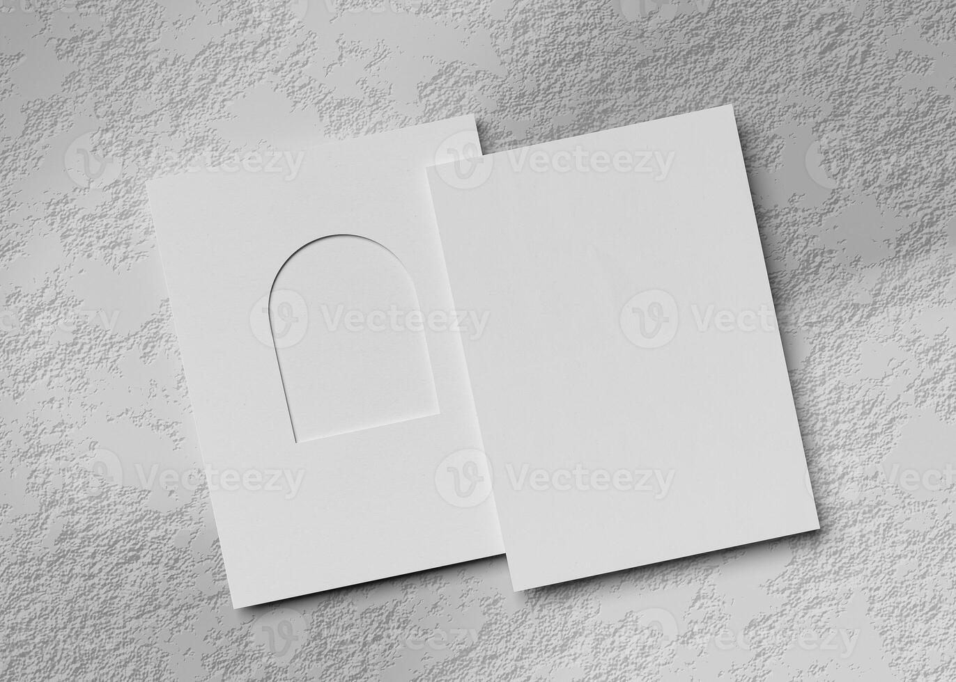 An invitation card with an arch-shaped hole, perfect for wedding invitation mockups and more. photo