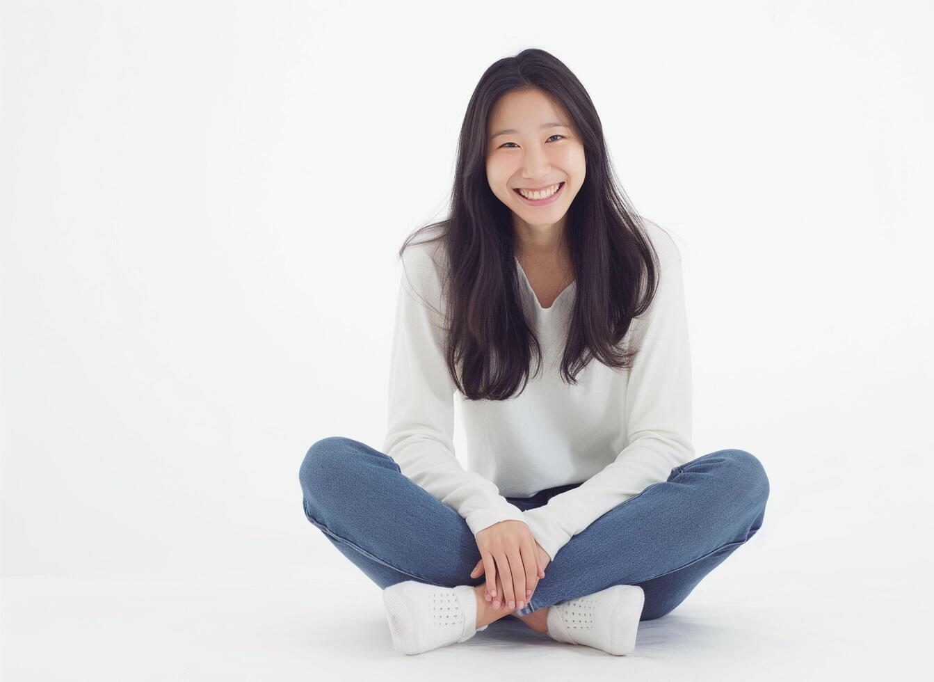 Beautiful young asian woman smiling happy and sitting photo