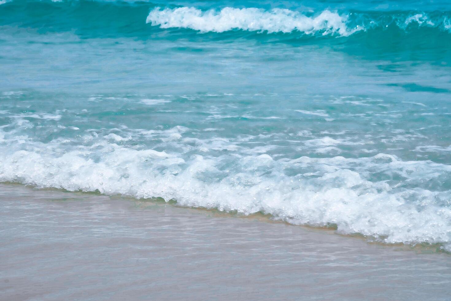 Soft wave on blue sea the tropical sandy beach photo