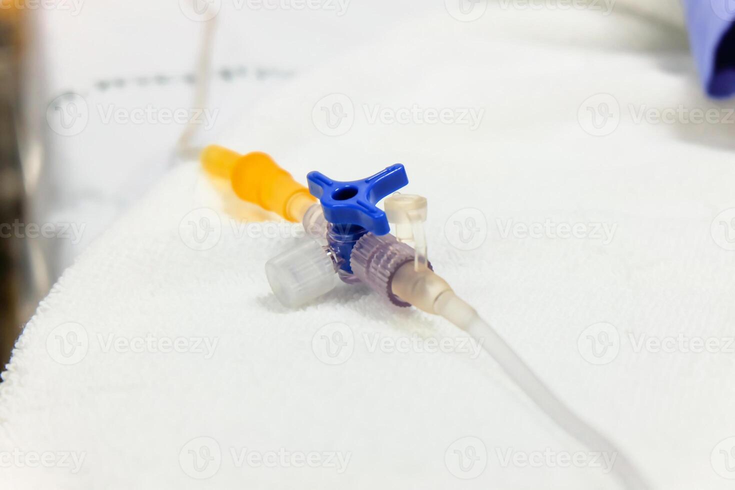 Saline solution tubes and joints connection for medication drip therapy photo
