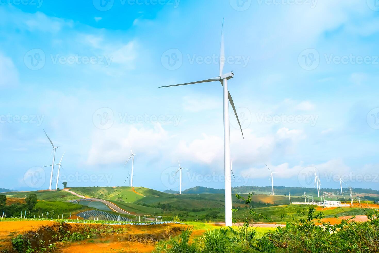 Wind turbines on the mountain of nature on blue sky at Khao Kho, Phetchabun, Thailand photo