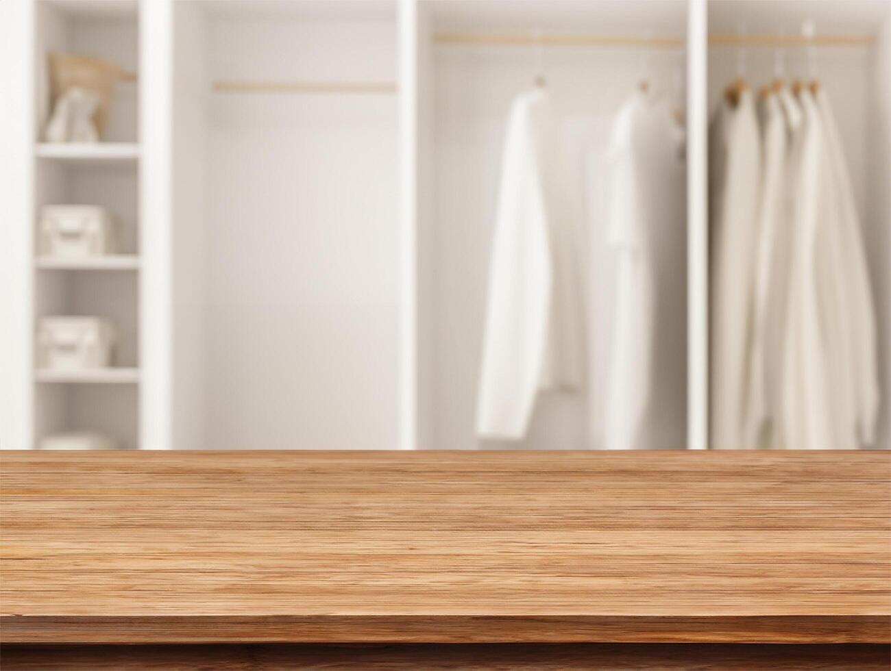 Wood table for display product with walk in closet wardrobe photo