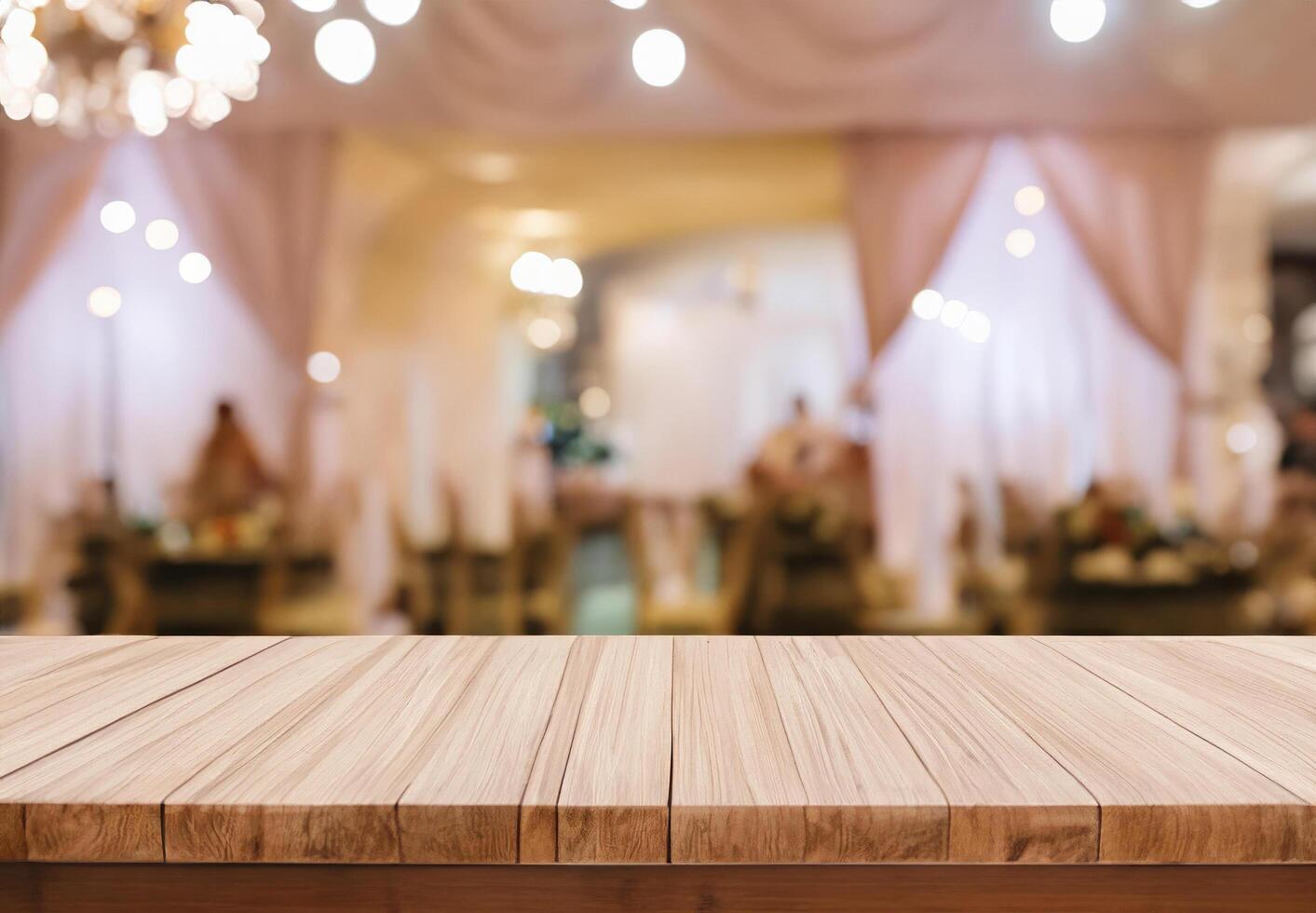 Wood table for display products on blurred wedding venue photo