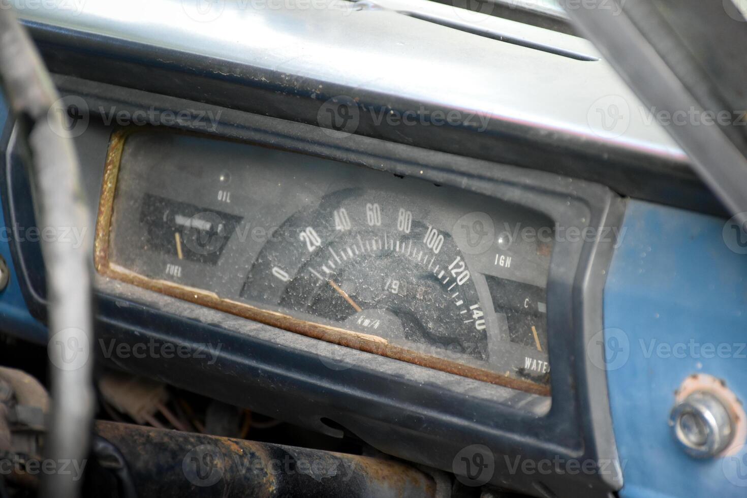 Classic car dashboard and steering wheel from the 90s a beautiful vibe in the 90's style,concept of 90s,old cars from the 1990s,classic car parts, dashboard of vintage car. photo