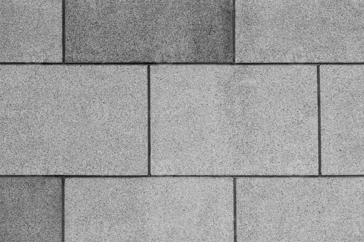 Brick stone wall texture background,Beautiful building decoration stone wall,raw stone floor for design or background,wide panorama of brick walls black and white,pattern texture background. photo