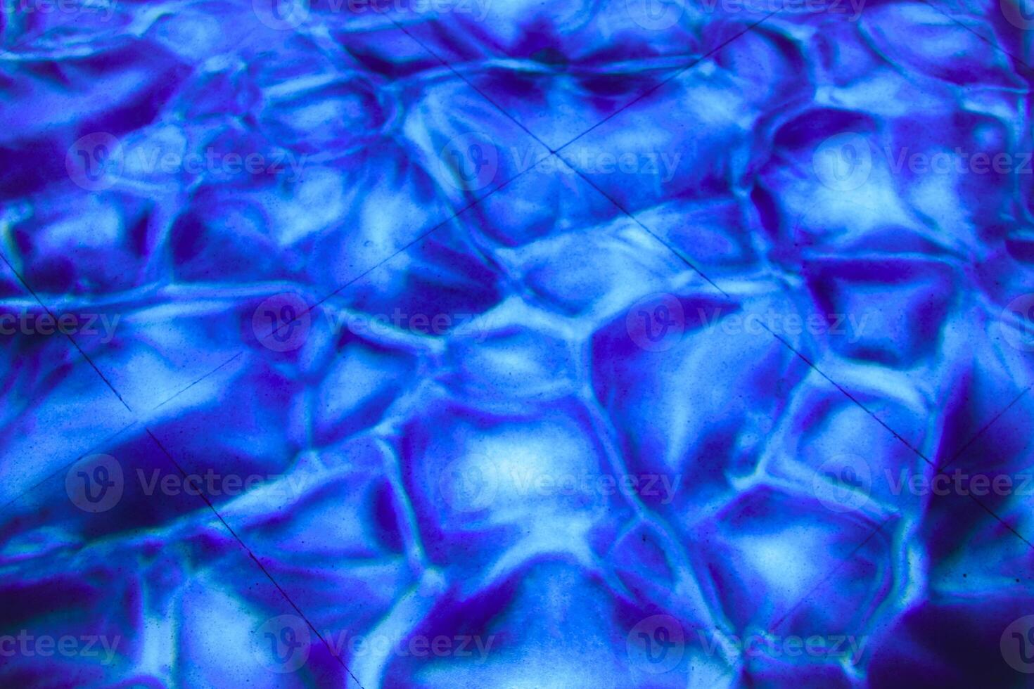 Blue light abstract texture background is water wave pattern or lava stone pattern on the floor. photo