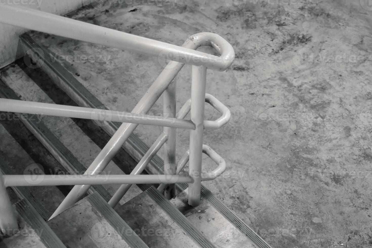 Close-up concrete stairs in a building or fire escape in a beautiful concrete pattern background. photo