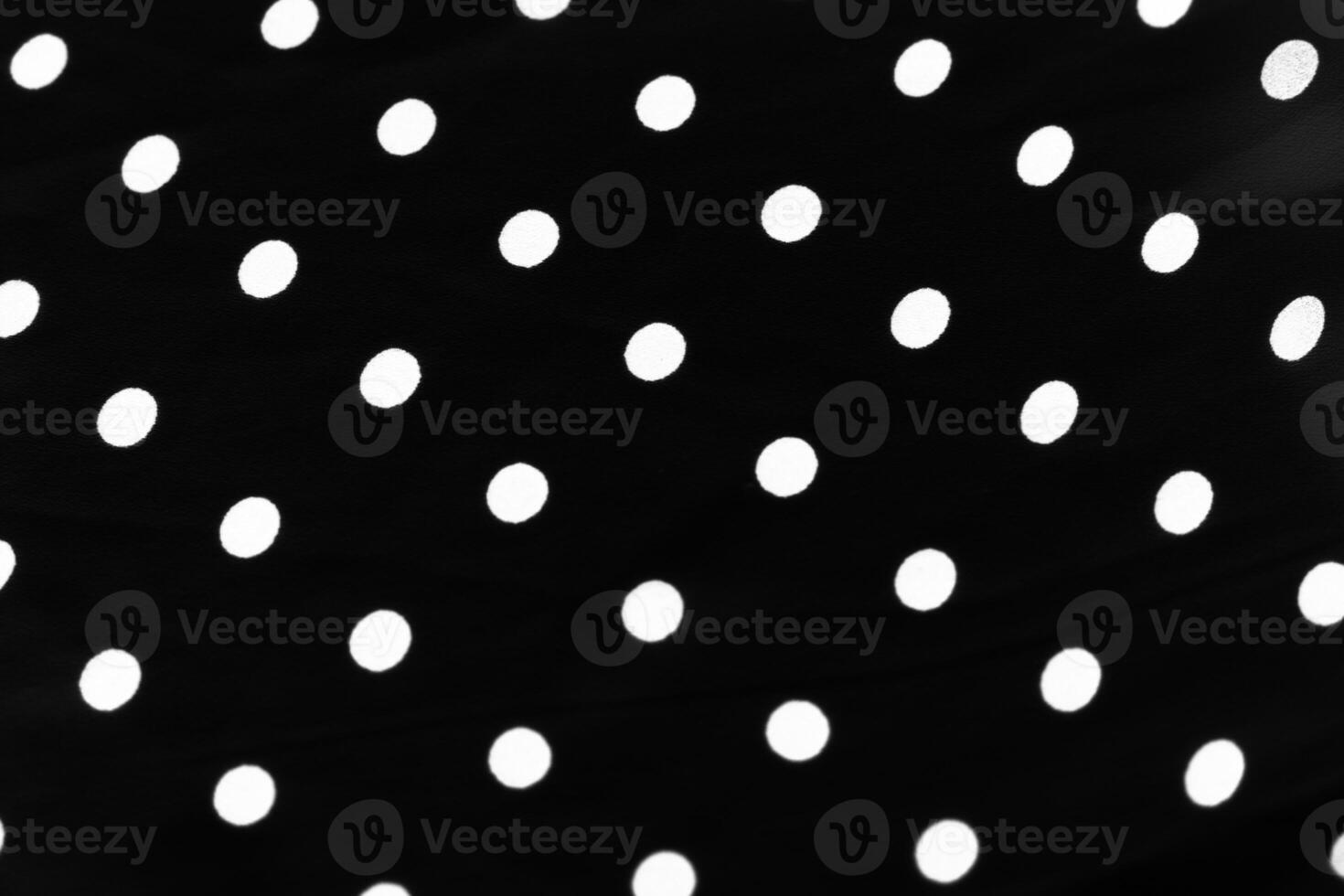 Vintage polka dot textile background texture, white dots on black luxury fabric design pattern photo