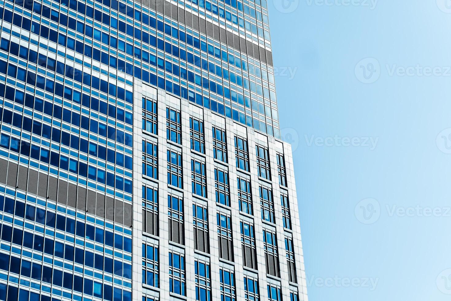 Contemporary office building in financial district, modern urban architecture photo