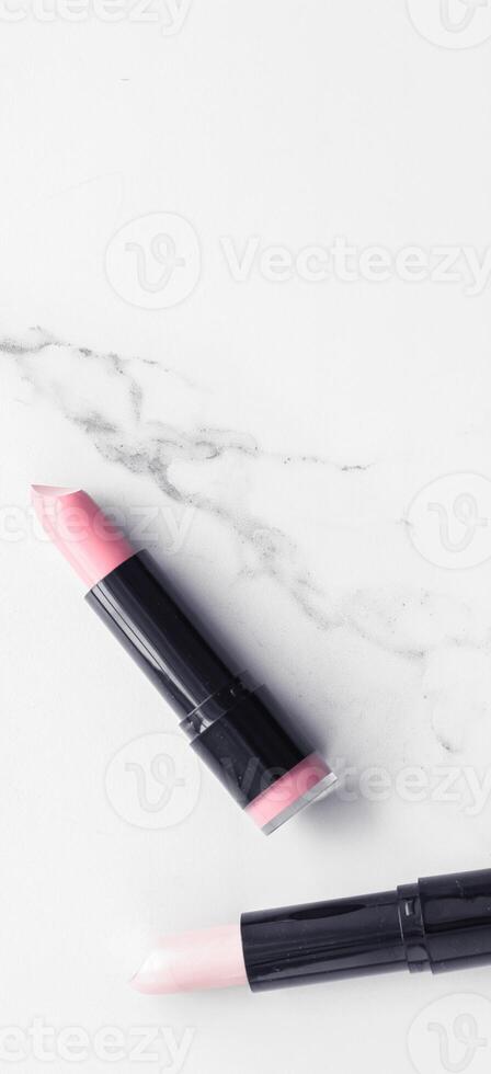 Make-up and cosmetics flatlay on marble photo