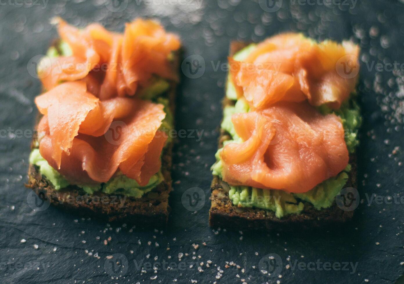 smoked salmon sandwich - healthy snacks and homemade food styled concept photo