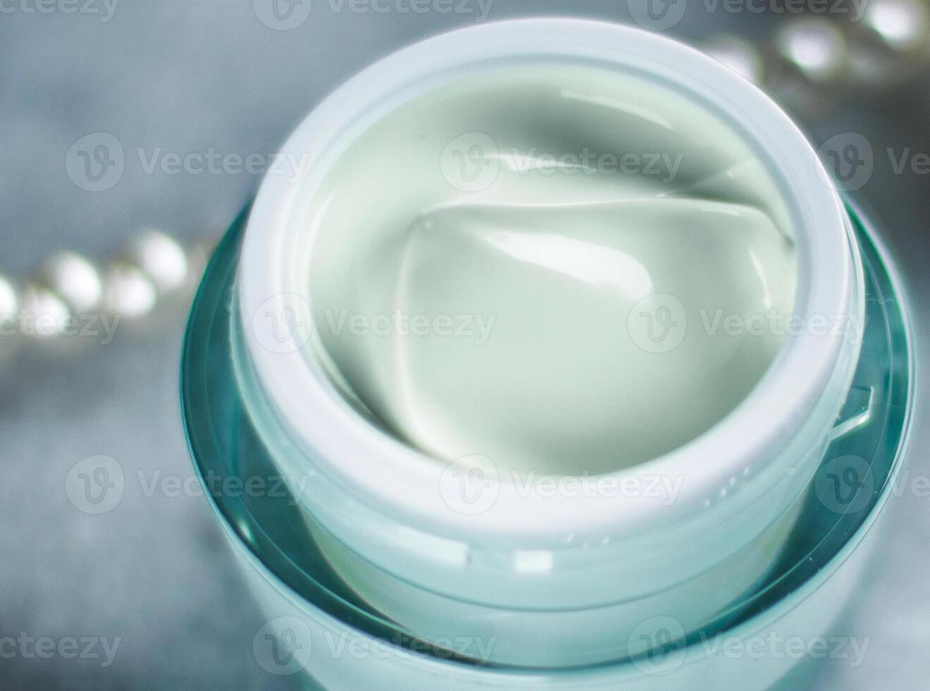 luxury cosmetic product, anti-age moisturizer with pearls photo