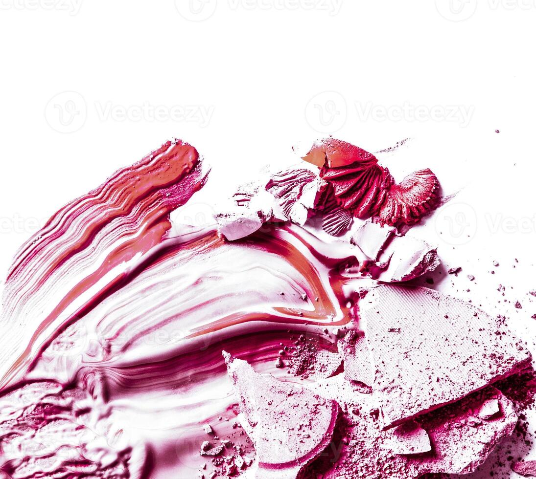 Crushed eyeshadow, powder and liquid foundation close-up isolated on white background photo