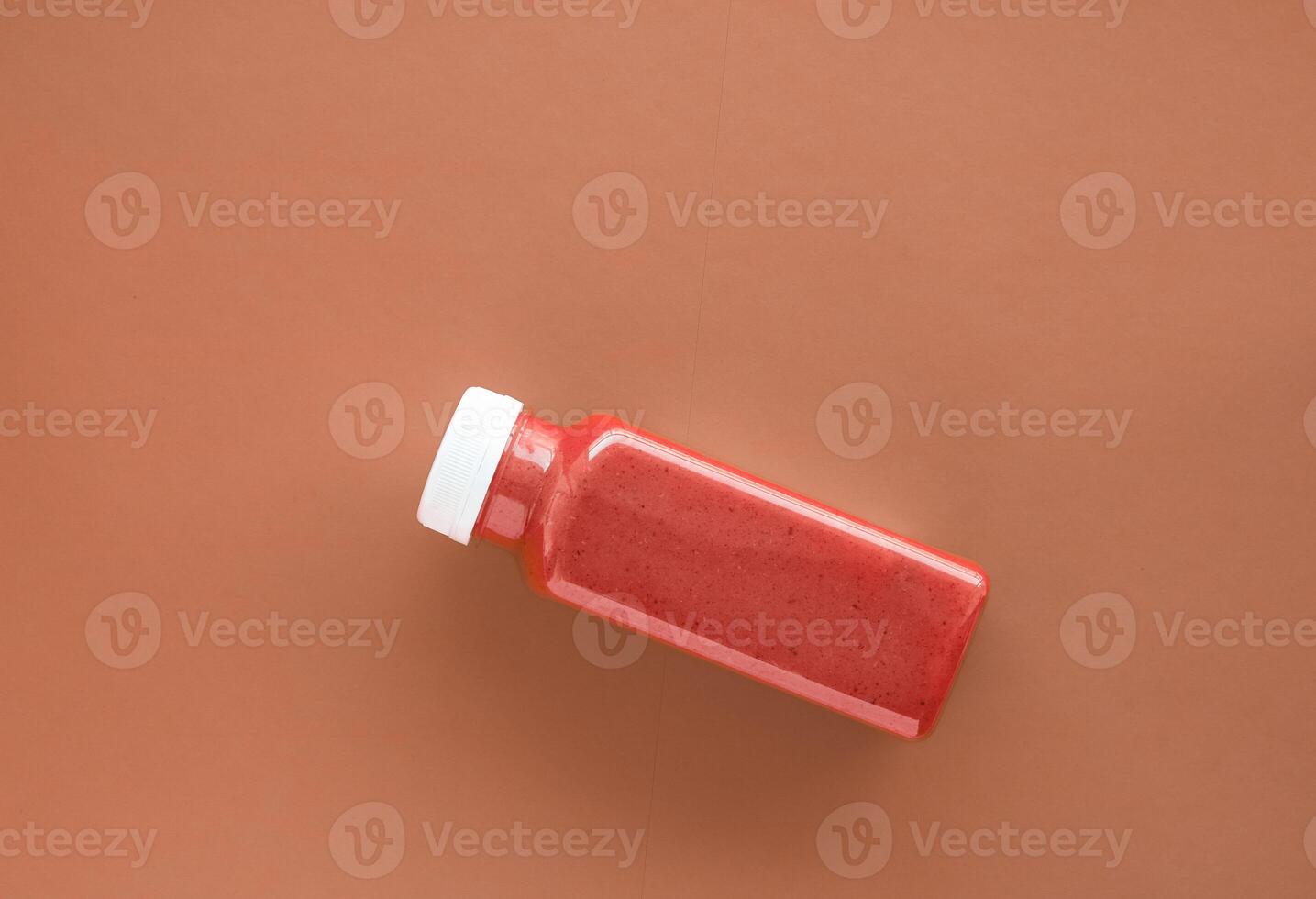 Detox superfood smoothie bottle for weight loss cleanse on.brown background, flatlay design for food and nutrition expert blog photo
