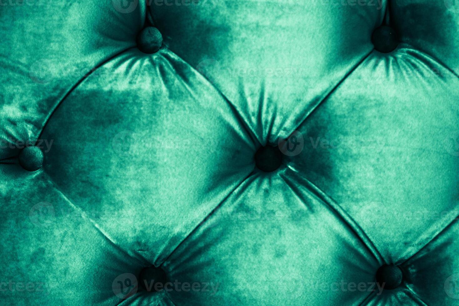 Emerald luxury velour quilted sofa upholstery with buttons, elegant green home decor texture and background photo