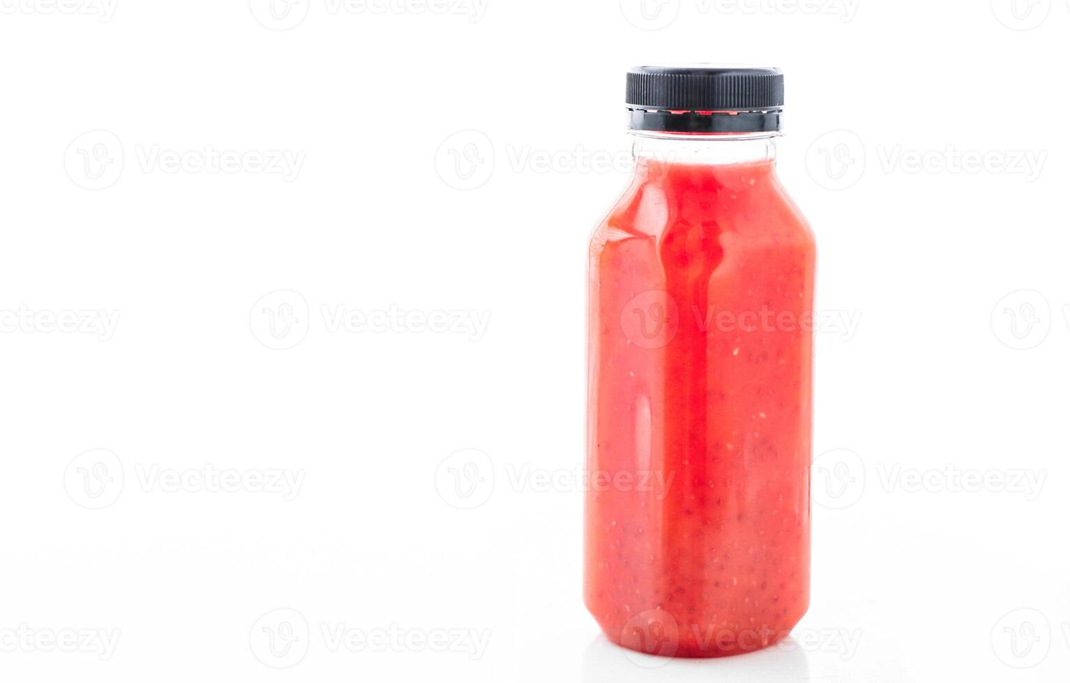 Detox red fruit smoothie juice in a bottle, diet catering delivery. Isolated on white background photo