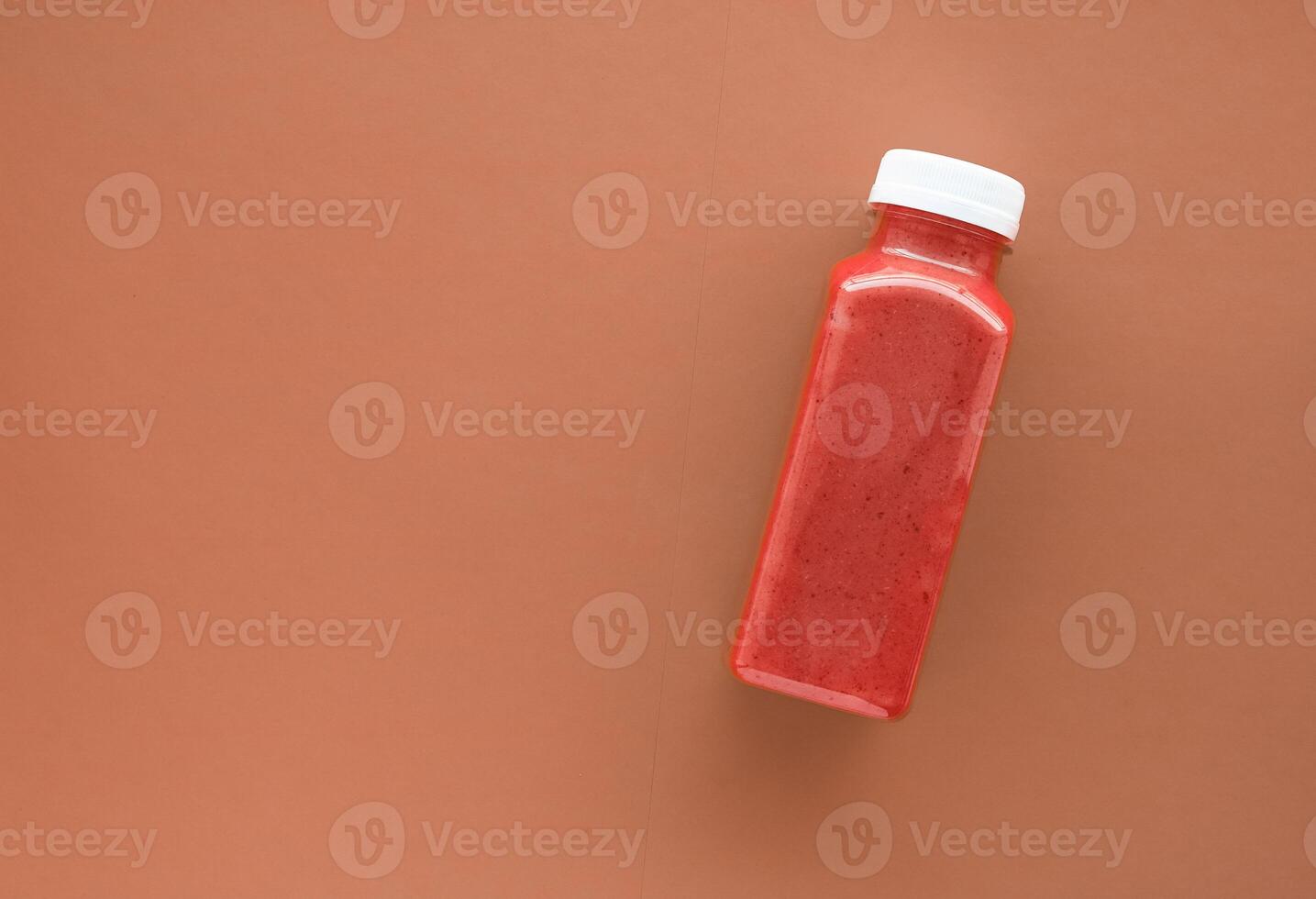 Detox superfood smoothie bottle for weight loss cleanse on.brown background, flatlay design for food and nutrition expert blog photo