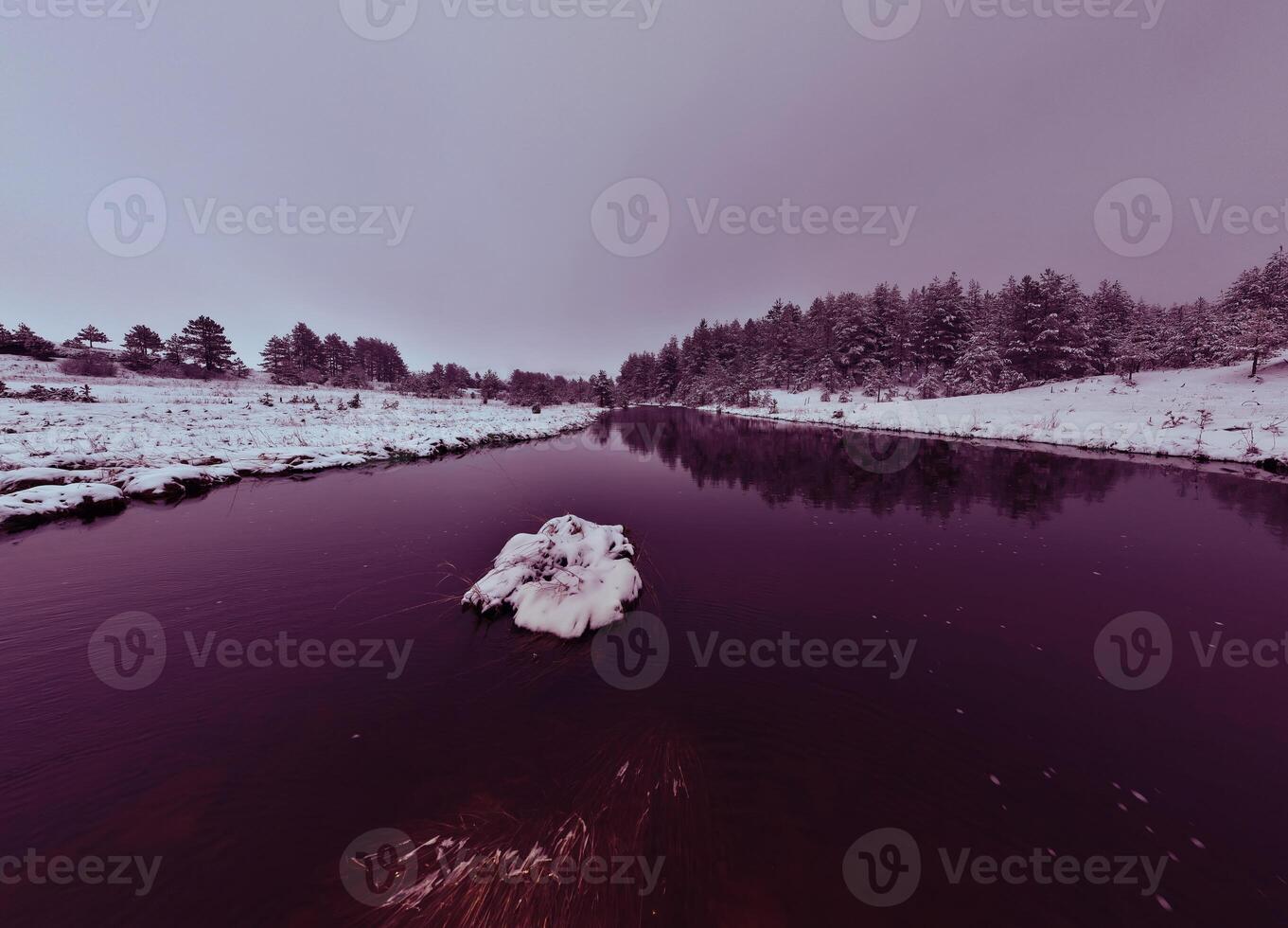 Amazing Cinematic Aerial View On Freezing River. Aerial View Flight Above Frozen Creek Scenic View Of Nature photo