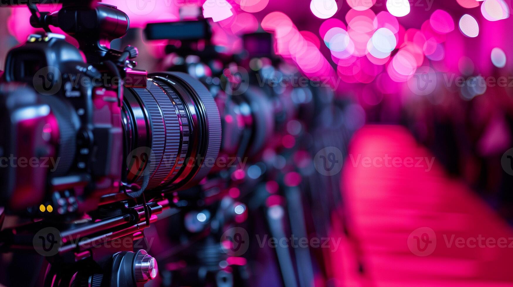 Photographers pit at a red carpet event, cameras ready to capture the glamour photo