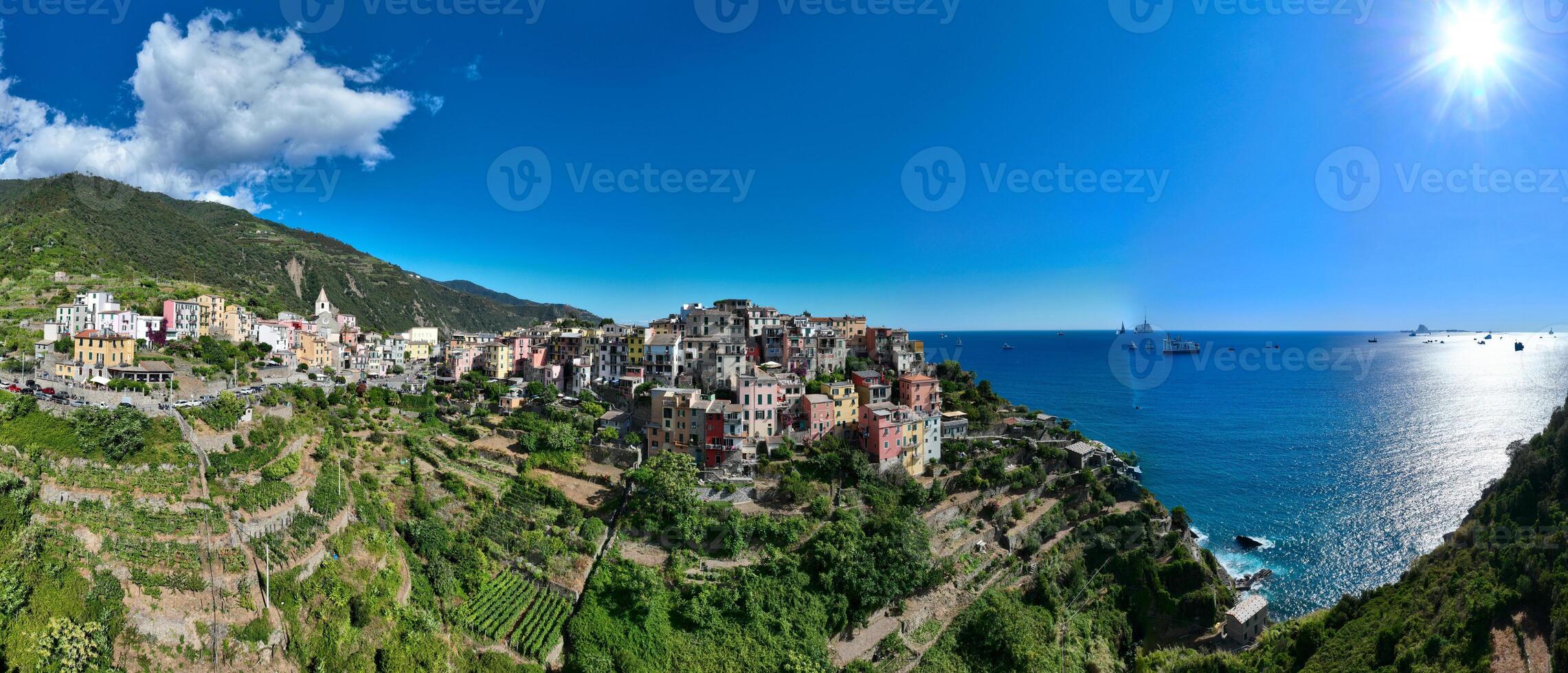 Manarola Village Cinque Terre Coast Italy. colorful town in Liguria one of five Cinque Terre. Manarola traditional Italian village in the National park Cinque Terre, with multicolored houses on rock photo