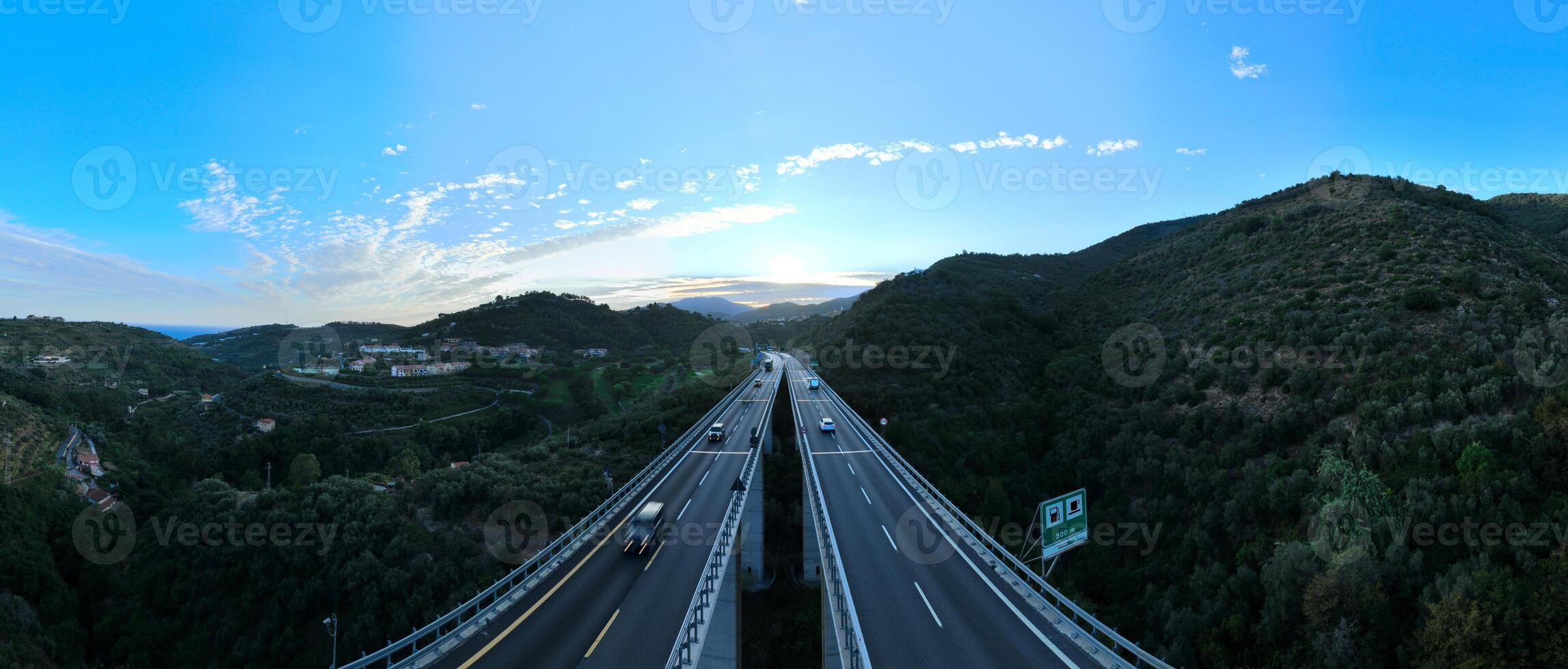Aerial view on highway bridge in the Italian mountains photo