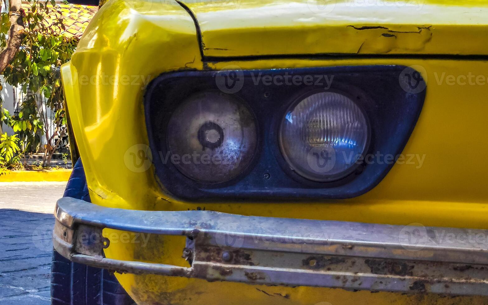 Yellow car vehicle transportation retro in city town Mexico. photo
