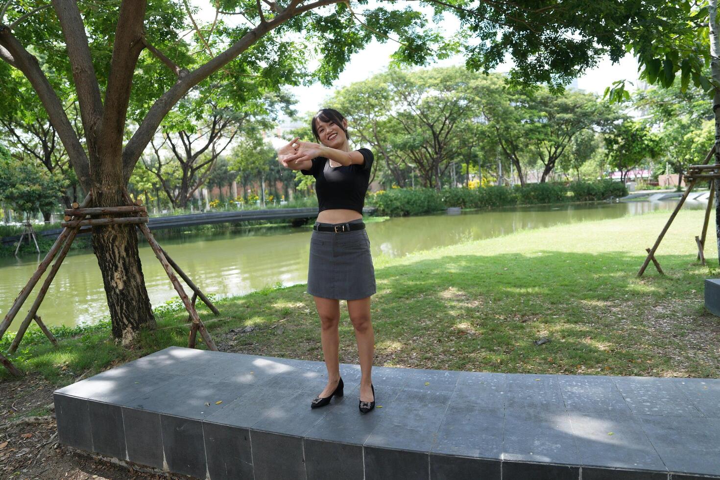 Asian women do freestyle hip hop and breakdancing in a public space in the middle of the city. With a cheerful and happy attitude photo
