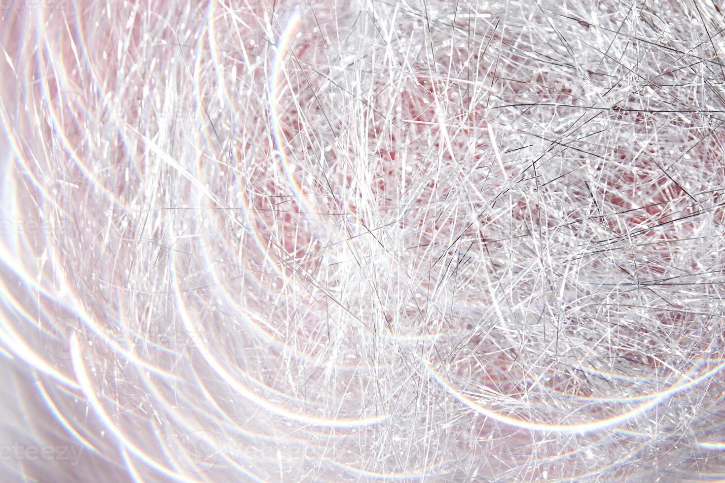 Light grey and white tinsel background with bokeh for Christmas. photo