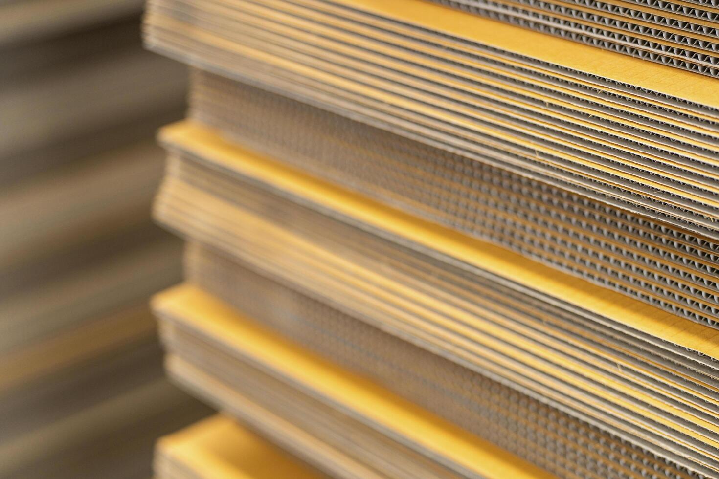 Cardboard, texture, background for graphics It is factory made cardboard waiting to be packed. photo