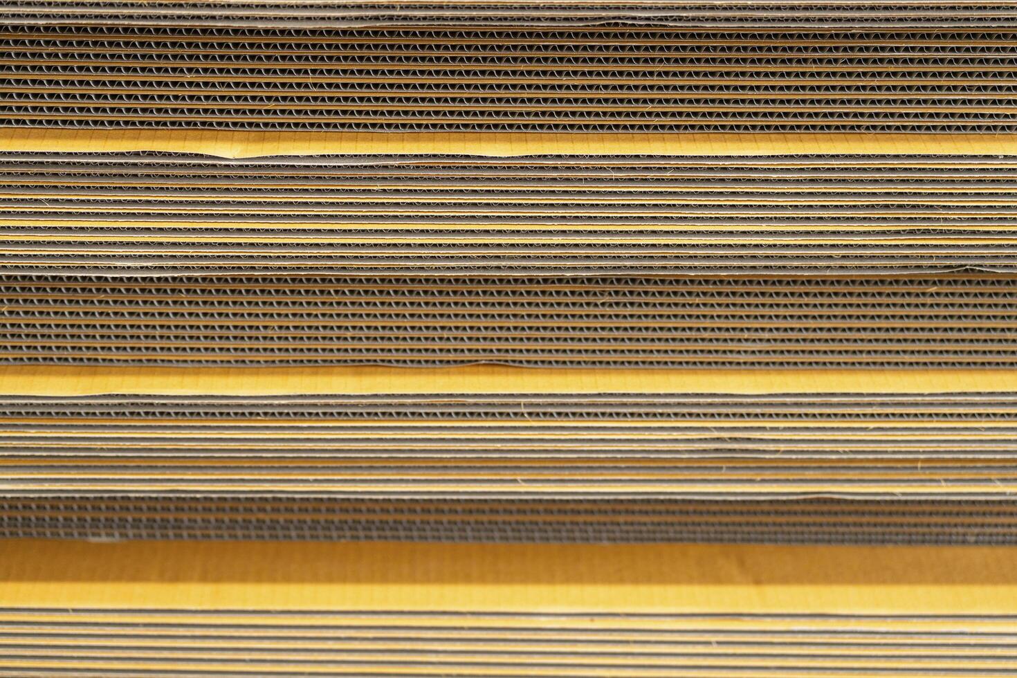 Cardboard, texture, background for graphics It is factory made cardboard waiting to be packed. photo