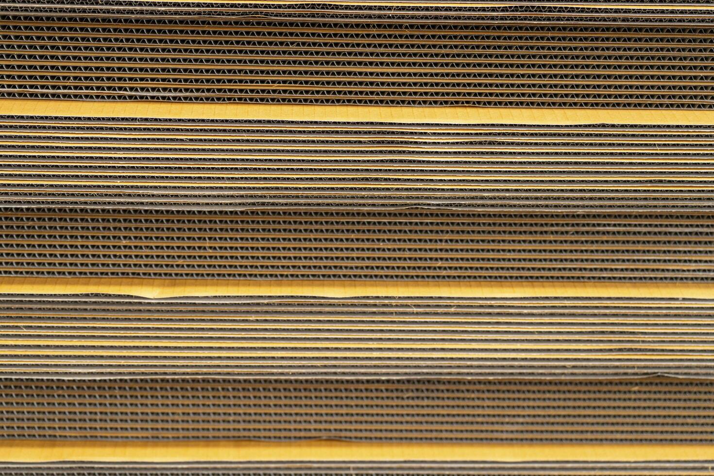 Cardboard, texture, background for graphics It is factory made cardboard waiting to be packed. photo