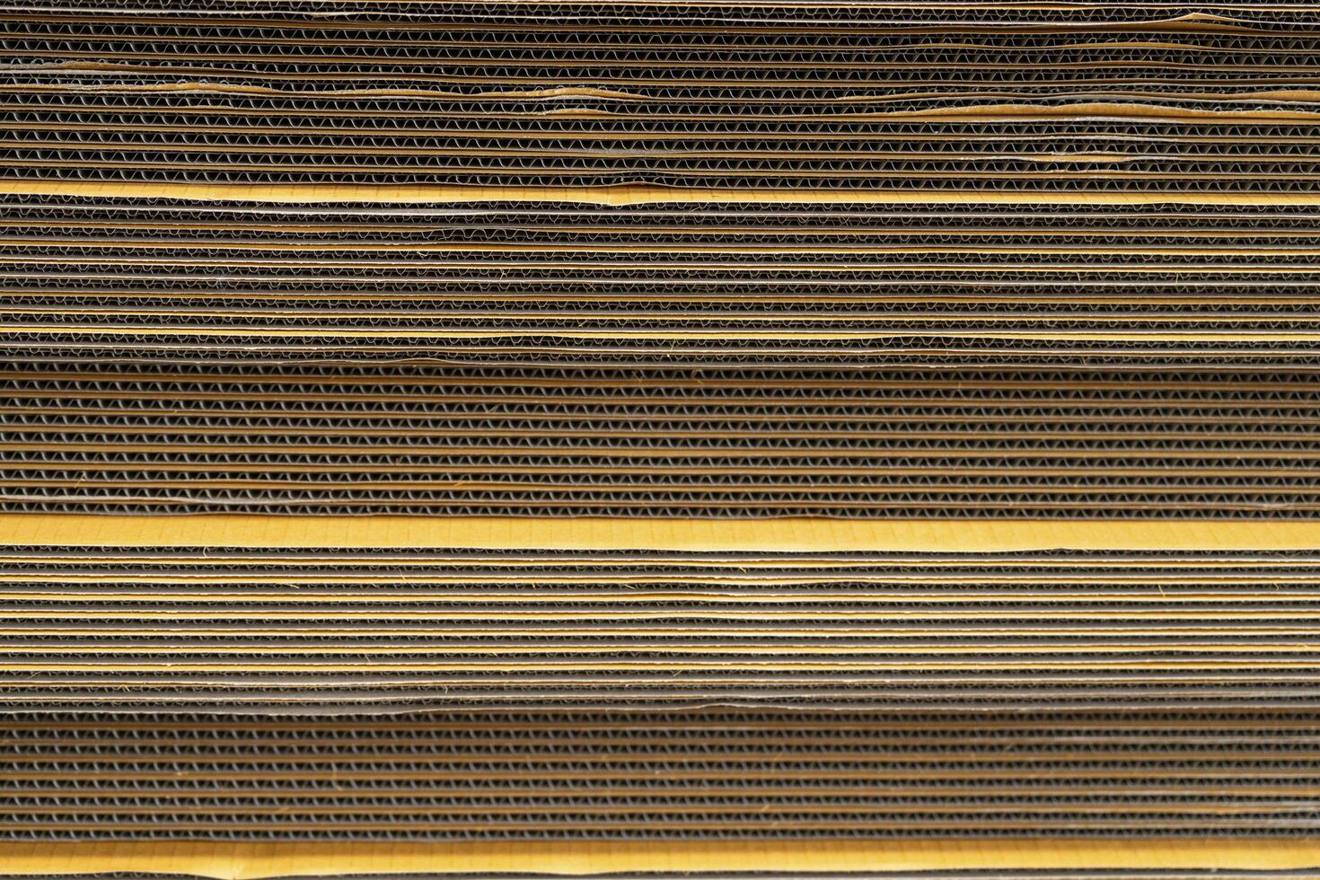 Cardboard, texture, background for graphics It is factory made cardboard waiting to be packed. photo