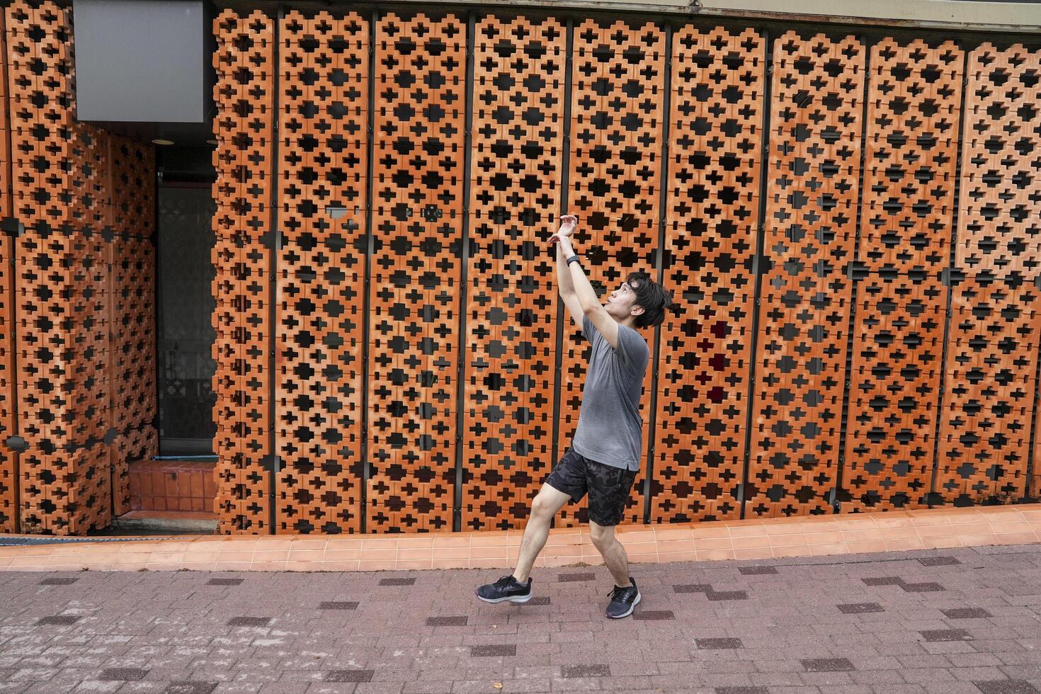 Men take a walk to relax after playing basketball in a public area, having fun and practicing at the same time. photo