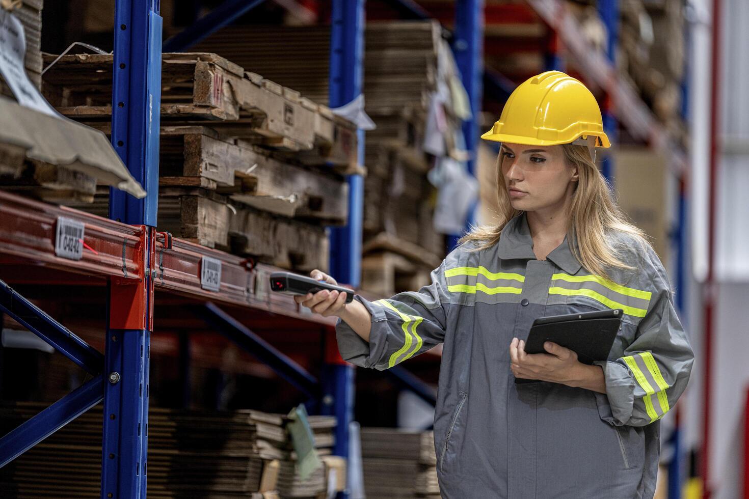 woman worker walking and checking stock items for shipping. Female inspecting the store factory. Logistics employees holding folders at on site warehouse area for shipping transportation. photo