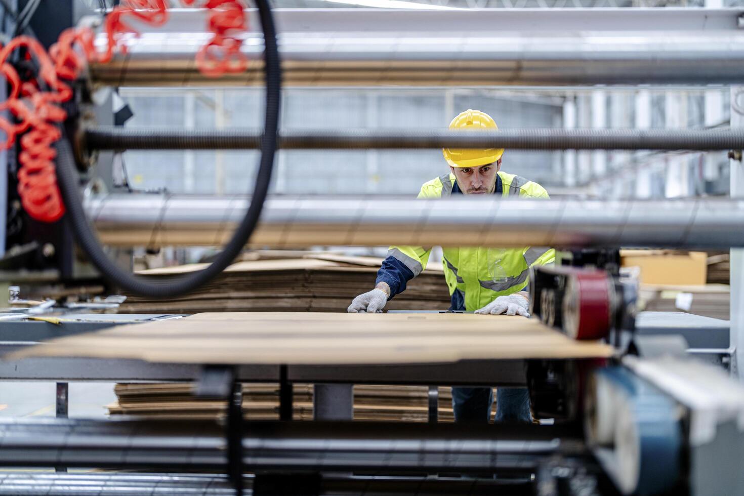 technician engineers checking the process on Heavy machine. mechanical engineering team production. Industry manufacturing. Worker holding tablet and folde. High technology production. photo