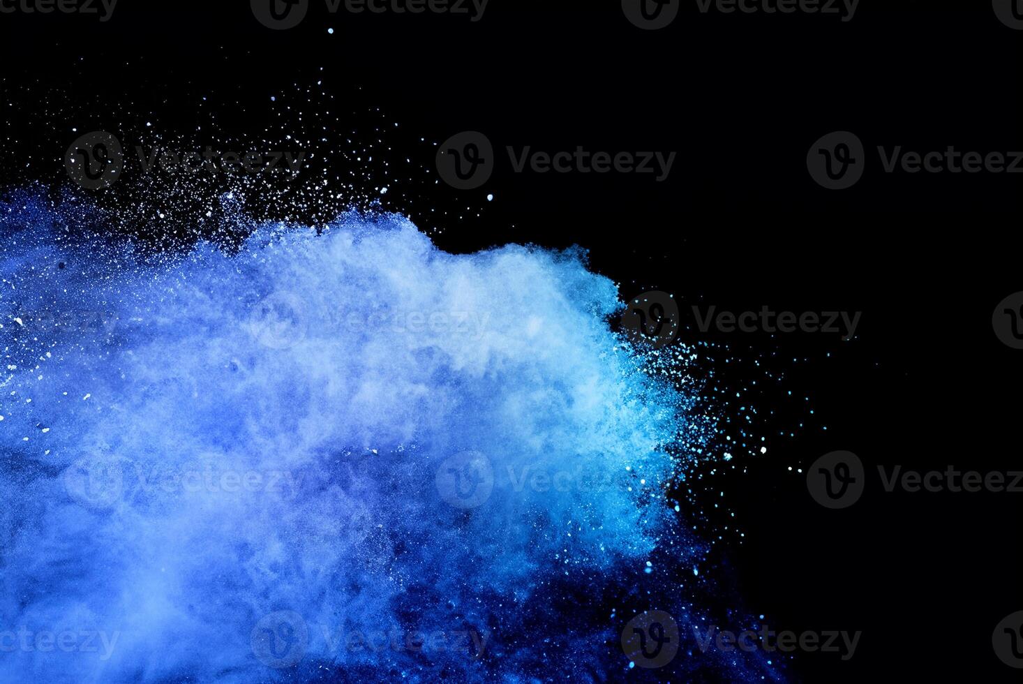 Macro Shot of Blue Dust Particle Splash on Black Background photo