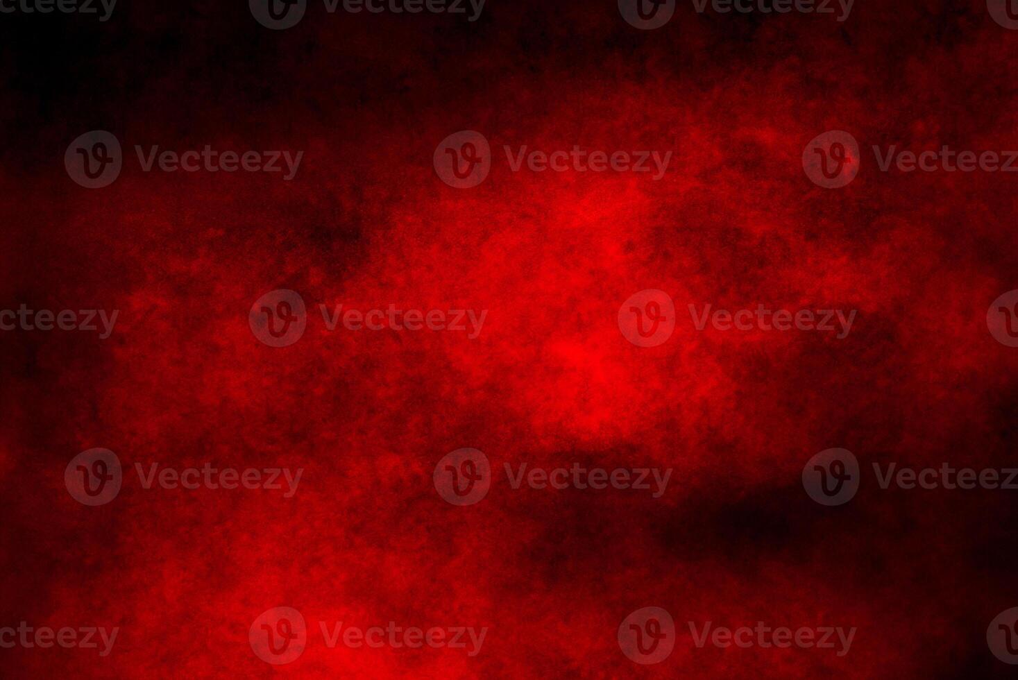 Crimson Powder Burst on Dark Background photo
