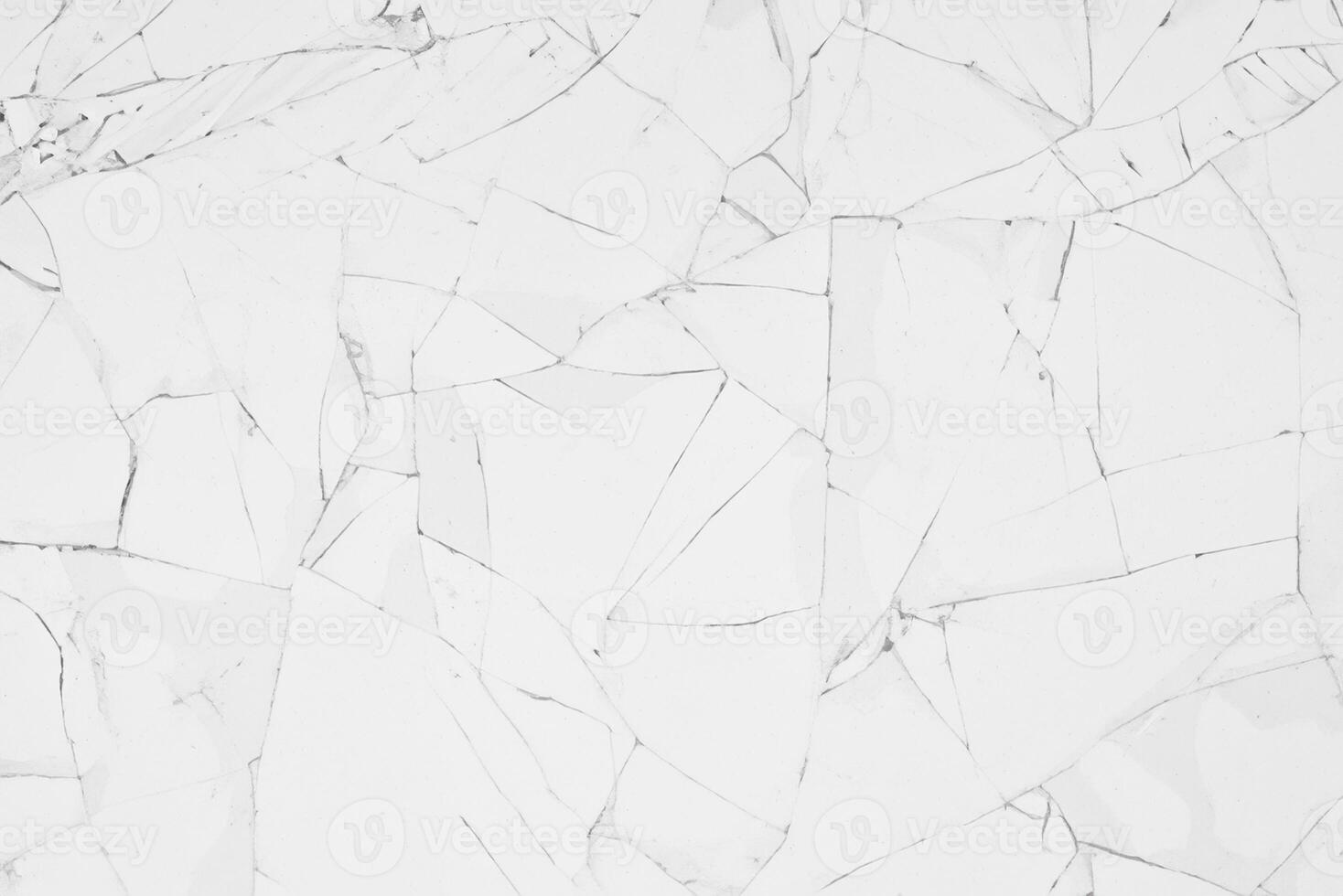 Close-up of White Cracked Glass Texture with Window-like Patterns photo