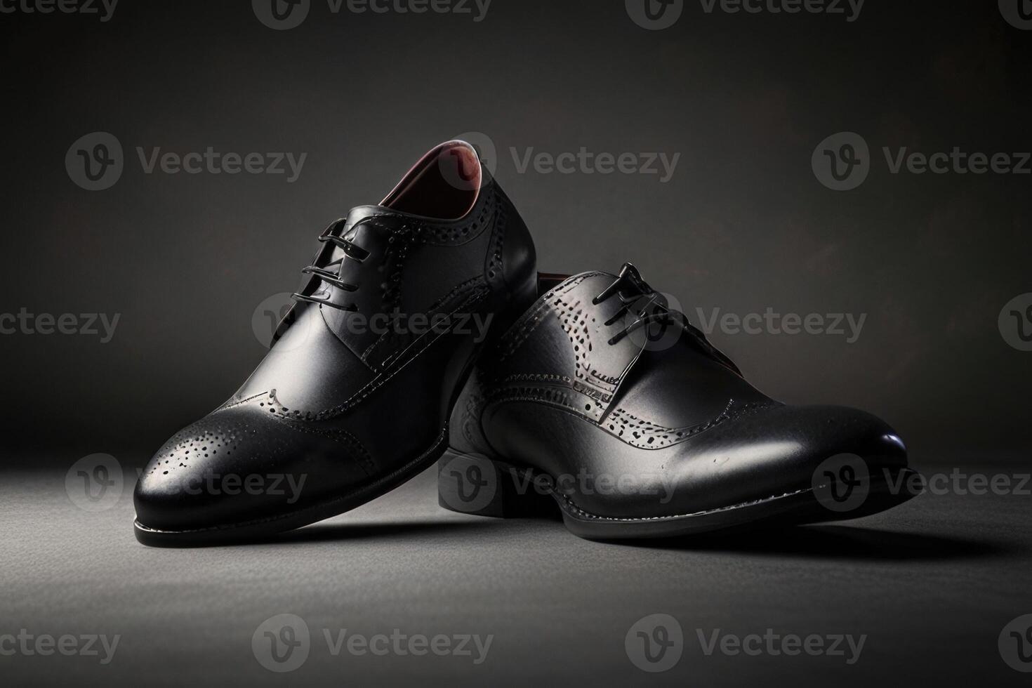 Man, black oxfords shoe is sitting on a dark background photo