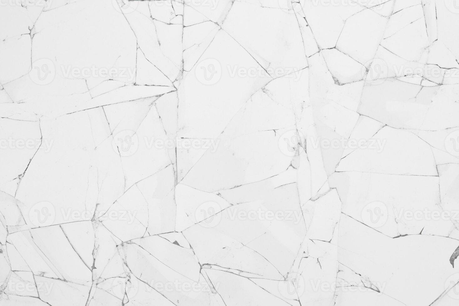 Close-up of White Cracked Glass Texture with Window-like Patterns photo